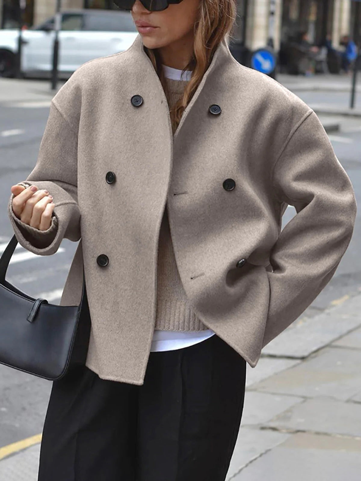 Trendy, loose-fitting jacket with button closure for women